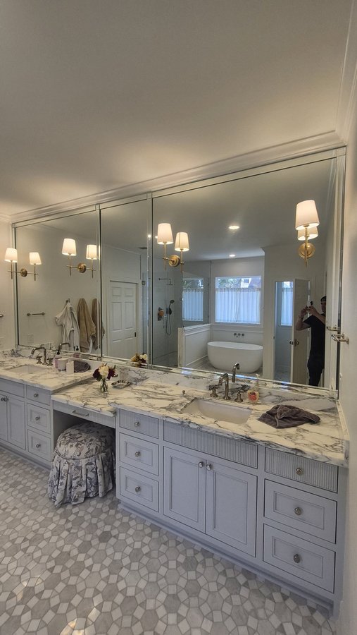 Glas Plus mirrors example: frameless polished mirror from wall to wall over a double vanity