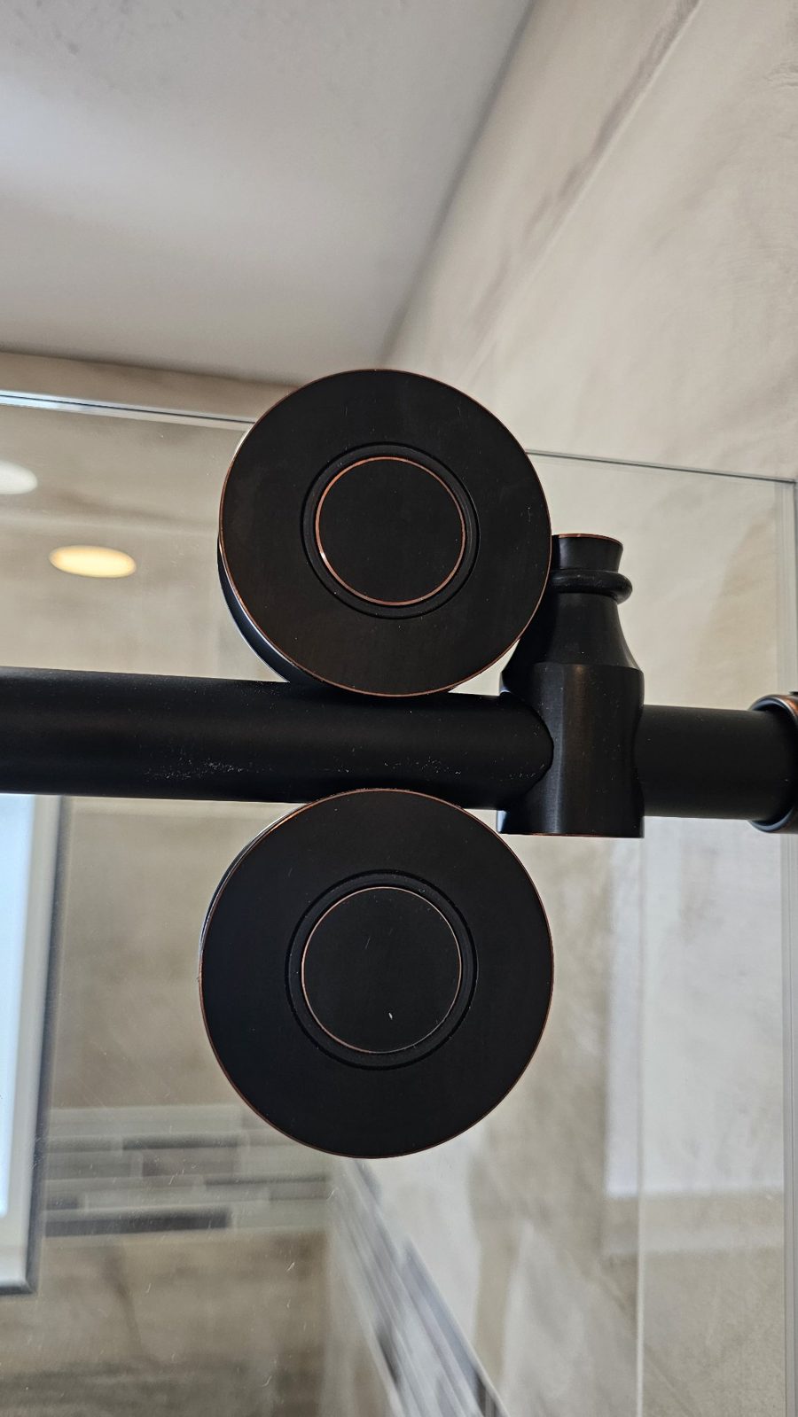 Close-up of Glas Plus black sliding rollers on the track