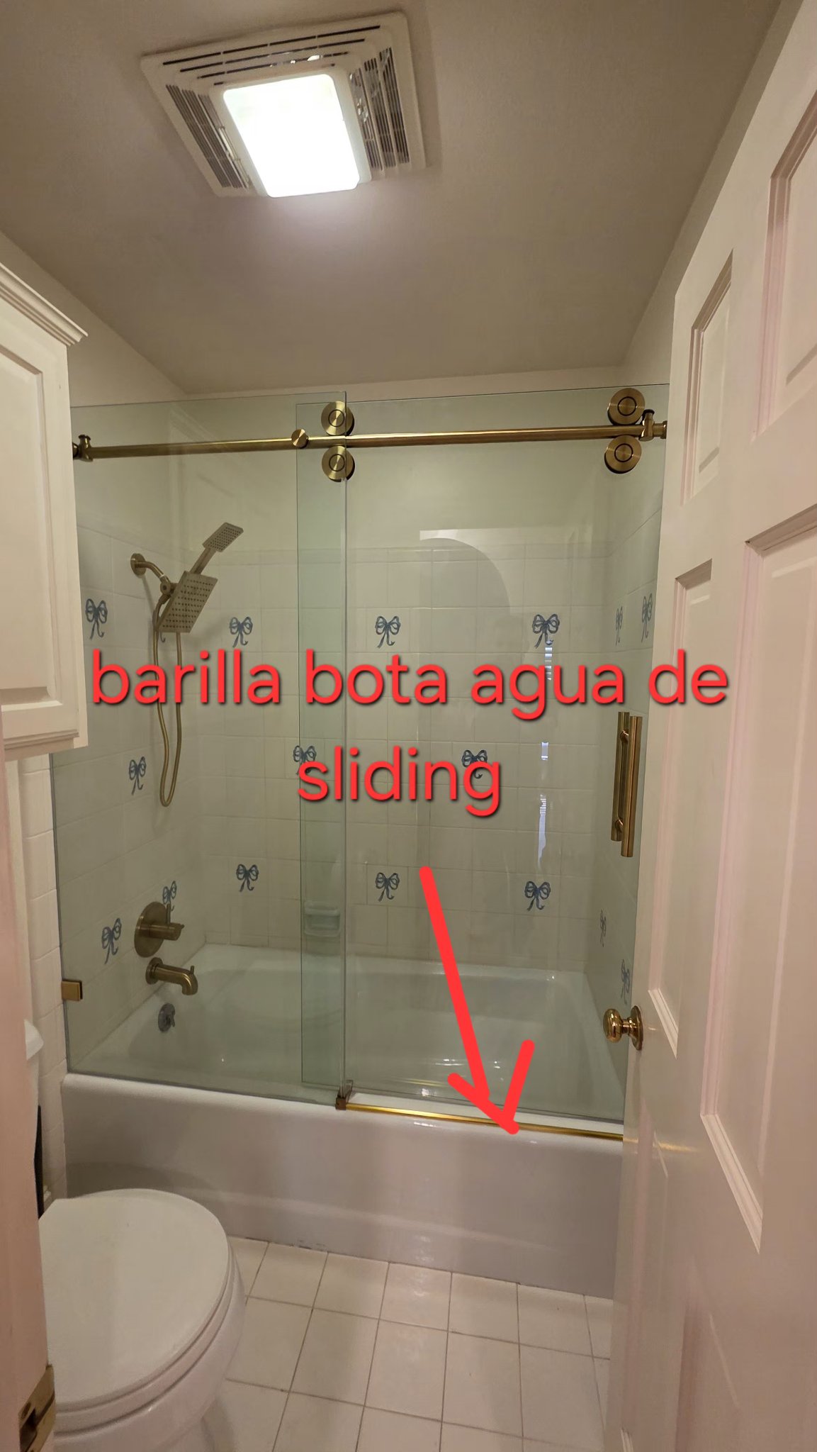 Sliding water drip rail (over a tub, brush gold)