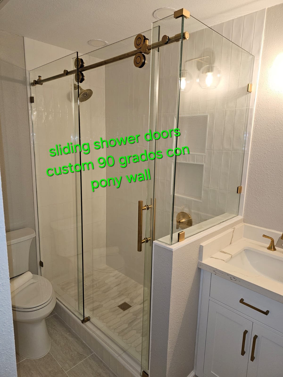 Custom 90-degree sliding shower doors with pony wall